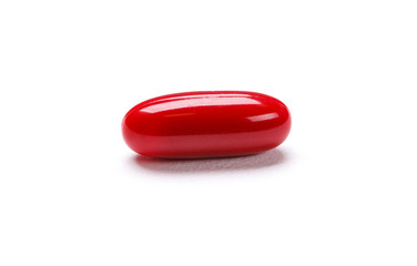 Drugs red capsule, isolated. Healthcare concept