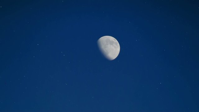 Moon in the night star sky.