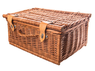 Handmade wicker picnic basket over white background
