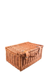 Handmade wicker picnic basket over white background