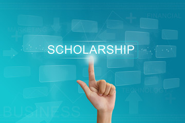 hand press on scholarship button on touch screen - 70463145