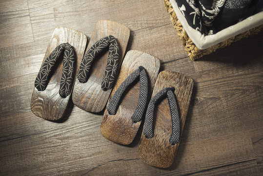 Onsen series : Wooden sandals on wooden floor
