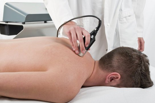 Close-up of laser treatment at physiotherapy