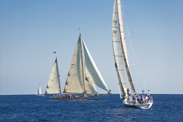 Naklejka na ściany i meble Ancient sailing boat during a regatta at the Panerai Classic Yac