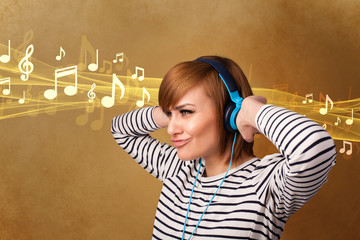 Young woman with headphones listening to music