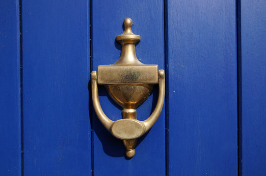 heurtoir de porte dor&eacute;