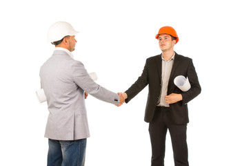 Two Caucasian Middle Age Engineers Shaking Hands