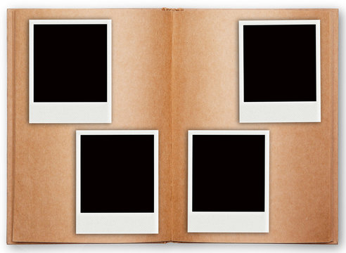 four polaroid frame with old book open