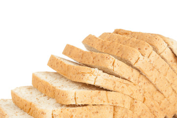 The cut loaf of bread on white background.