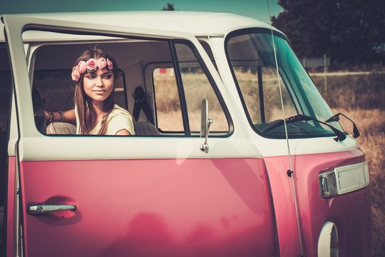 Hippie Girl In A Minivan On A Road Trip