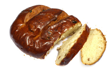 Loaf with raisins on white