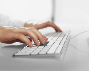 hands pushing keyboard