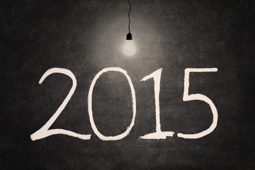 Bright lightbulb with number 2015