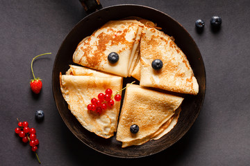 pancakes with berries © Maksim Shebeko