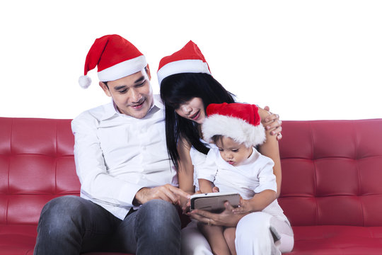 Christmas Family Using Digital Tablet