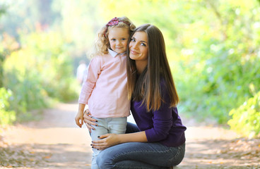 Fototapeta premium Lovely mom and child in sunny day