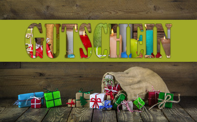 Many colorful christmas presents on wooden old background.