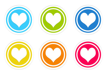 Set of rounded colorful icons with heart symbol