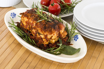 roast of veal with rosemary and tomatoes