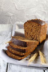 Fresh bread on wooden table, close up
