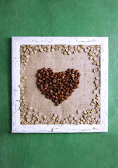 Wooden frame and heart made with coffee grains