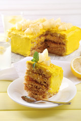 Tasty lemon dessert on wooden table