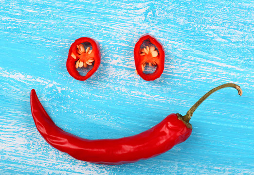 Chili pepper on wooden table