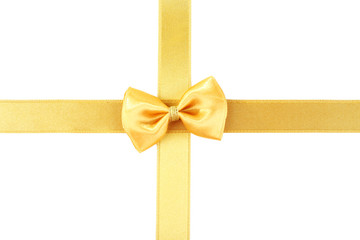 Golden ribbon and bow isolated on white