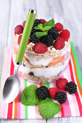 Healthy breakfast - yogurt with  fresh fruit, berries and