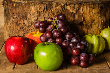 Still life with on the timber full of fruit
