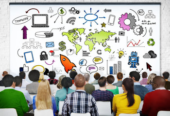 Group of People in Seminar with Symbols