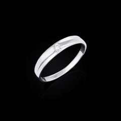 Diamond ring on black background