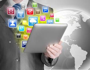 Business man use tablet pc with colorful application icons