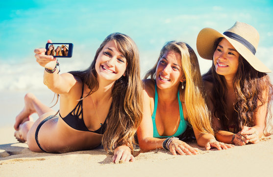 Girls Taking a Selfie at the Beach
