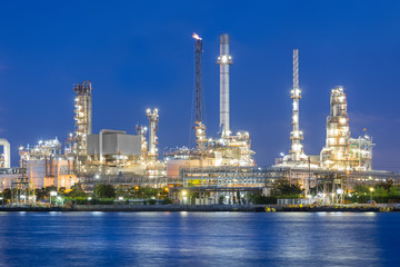 Fototapeta premium Oil gas refinery plant. May called petroleum, production or petrochemical plant. Industrial factory construction from engineering technology with steel pipe, pipeline, tank. Business for power energy.