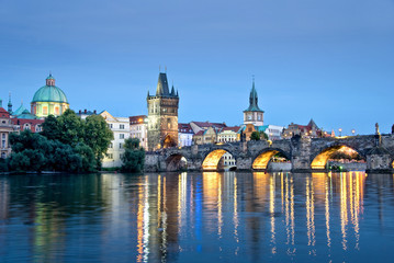 Obraz na płótnie Canvas Vltava river and Charles bridge by night, Prague, Czech republic