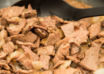 Cooking Sliced Beef in Pan
