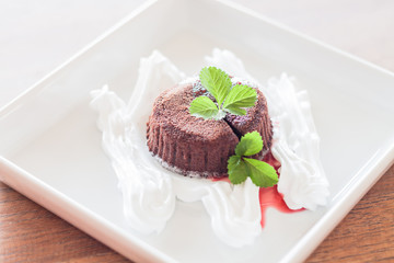 Chocolate lava with strawberry sauce