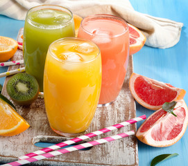 Citrus juice   on  wooden board