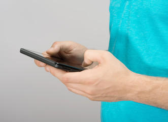 close up hands multitasking man using tablet