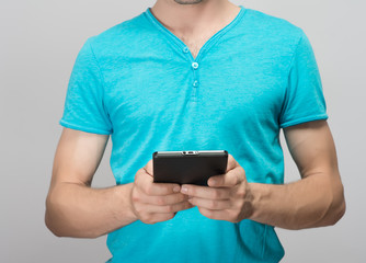 close up hands multitasking man using tablet