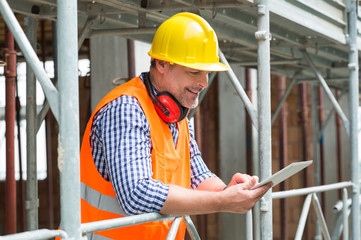 Male Architect Using Digital Tablet