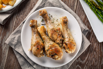 Roast chicken with potatoes and asparagus