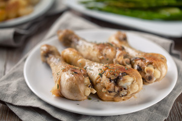Roast chicken with potatoes and asparagus
