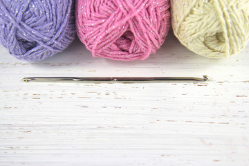 Yarn Wool pastel colours with crochet hook and copy space