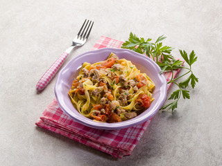 tagliatelle with sausage and fresh tomatoes