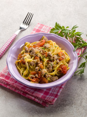 tagliatelle with sausage and fresh tomatoes