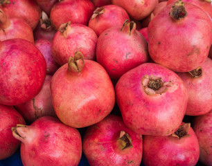 Pomegranates at the Market.  Fresh farmer's market pomegranates.