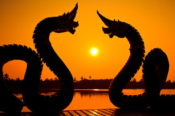 A couple of Naga in the sunset