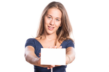 Cute young girl holding a card on white isolated background